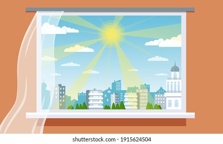 
Large panoramic window from the room, overlooking
on a sunny day with cityscape with houses.