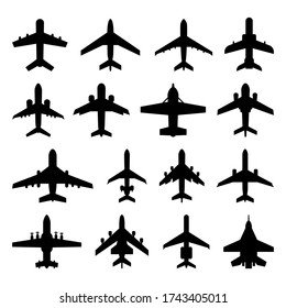 A large set of different types of aircraft silhouettes. In flight. Vector illustration on a white isolated background.