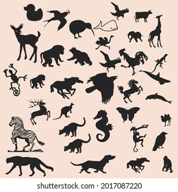 A large set of domestic and wild animals silhouette vector, birds, and fish. Collection of cute cartoon characters isolated on white background. Set of cute cartoon animals. 