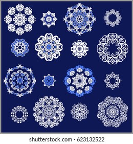 Large set of round ornaments. White mandalas on a blue background. Set for design, logos, wedding, kaleidoscope, medallion. Vector illustration.