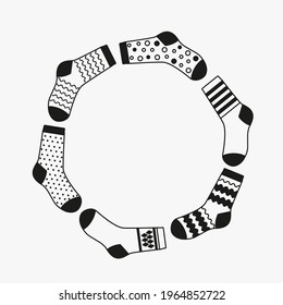 A large set of socks with a variety of patterns and ornaments. baby socks in cartoon linear style. vector illustration isolated on white background