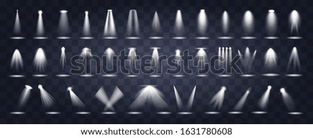 Large set of stage lighting Vector icons showing spotlights shining down through the darkness with various orientations, narrow or broad beams, and single through to four beams together