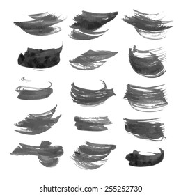 Large set of strokes texture in black ink on white paper