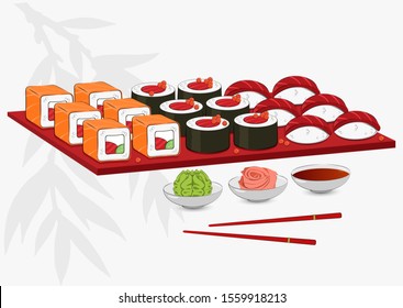 A large set of sushi on a tray. Wasabi, ginger, soy sauce. Red chopsticks for sushi. Rice sushi with nori, tuna and caviar, philadelphia roll, rice ball.