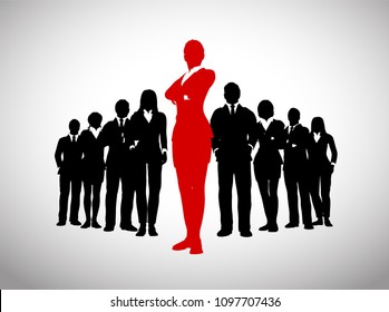 A large team of successful executives in silhouettes led by a great remarkable Female leader in red who stands in front of them.