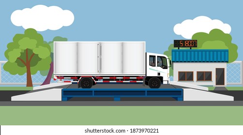 Large trucks carrying cargo open side. on the weighing scale. Control station building on the front.