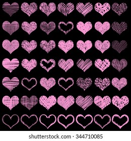Large vector hearts set for wedding and valentine design. Collection of hand drawn hearts. Red or pink color on black background.