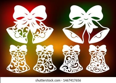 Laser cut christmas bell set with pattern of snowflakes and swirls. Xmas decorations cutting templates collection, vector.