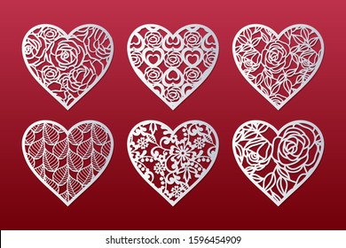 Laser cut hearts set with pattern of roses, leaves and flowers. Templates for interior design, layouts wedding cards, invitations, Valentine's Day cards. Vector floral hearts.