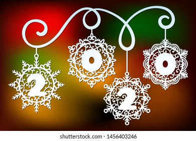 Laser cut number 2020 template in snowflakes form hanging on a swirl. Template of Christmas balls with snowflake, Xmas cut out decoration.