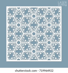 Laser cut square ornamental panel with snowflakes pattern. Template of Christmas invitation or New Year greeting card. Cabinet fretwork screen. Metal design, wood carving.