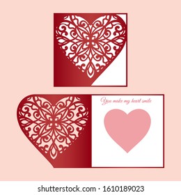 Laser cut template of fold card with patterned heart for brochures, wedding invitations or Valentine's Day greeting card.