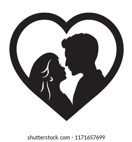 Laser cut template of male and female silhouette opposite each other. Couple in love. Bride and groom in heart frame for wedding invitation card or table topper. Faces in profile at Valentine's day.