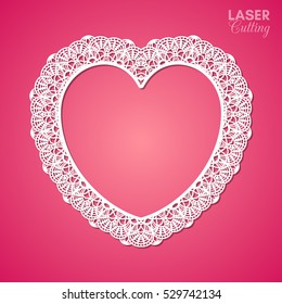Laser cut vector frame in the shape of a heart with lace border, vector ornament, vintage frame. Photo frame for paper cutting. The basis for a paper doily. Valentine background.
