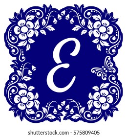 Laser cutting template alphabet. Openwork card with flowers, leaves, buds, swirls, butterfly. Carved edges and letter E in middle. 1:1 ratio, square size 15*15 sm default. Vector illustration.