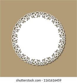 Laser cutting template of ornamental frame with openwork decoration on gold background. Wedding or greeting invitation card with lacy edge of the border at vintage style. Round vector silhouette.