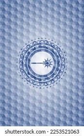 Lasersymbol in blauem Emblem mit geometrischem Muster. 