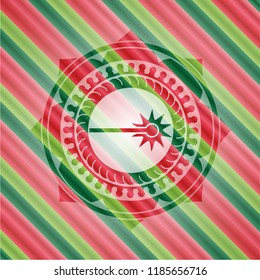 laser icon inside christmas emblem.