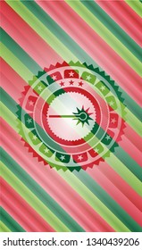 laser icon inside christmas emblem.