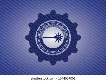 laser icon inside emblem with denim high quality background
