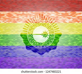 laser icon inside emblem on mosaic background with the colors of the LGBT flag