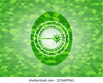 laser icon inside green emblem with triangle mosaic background