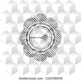 laser icon inside grey badge with geometric cube white background
