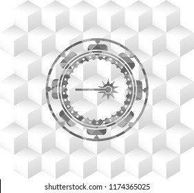 laser icon inside grey badge with geometric cube white background