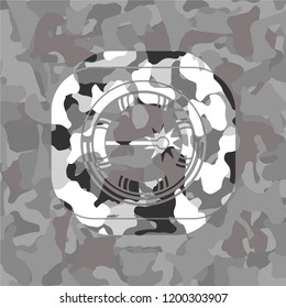 laser icon inside grey camo emblem