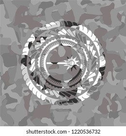 laser icon inside grey camo texture
