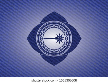 laser icon inside jean or denim emblem or badge background