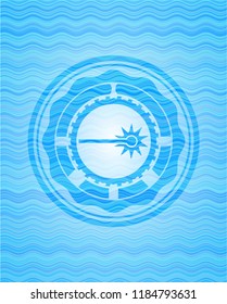 laser icon inside light blue water wave emblem background.