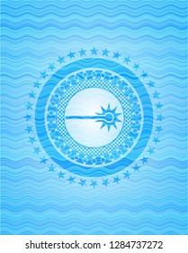 laser icon inside light blue water wave emblem background.