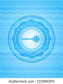 laser icon inside sky blue water wave style badge.