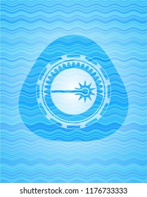 laser icon inside water wave representation badge background.