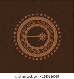 laser icon inside wooden emblem. Retro