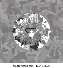 lat pull down, exercise icon inside grey camo emblem