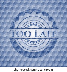 Too Late blue badge with geometric pattern background.