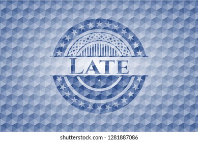 Late blue emblem with geometric pattern background.