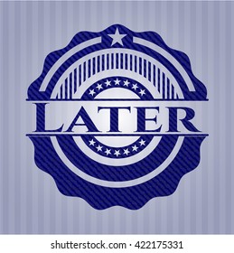 Later badge with denim background
