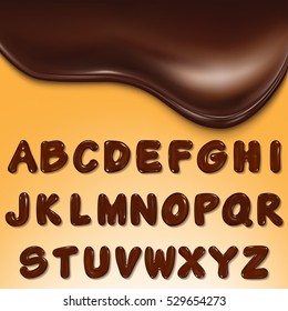 Latin alphabet made of dark melted chocolate .