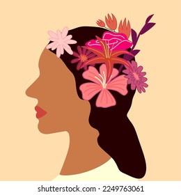 A latin woman with flowers in hair on orange background. Place for text.