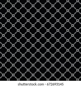 Lattice pattern with trendy lattice on a background. Repeating pattern background. Clover leaves of four leaves. Modern stylish texture. Repeating geometric tiles.