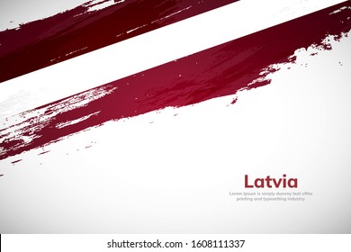 Latvia flag made in brush stroke background. National day of Latvia. Creative Latvia national country flag icon. Abstract painted grunge style brush flag background.