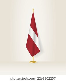 Latvia flag on a flag stand. Vector illustration.