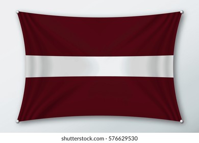 latvia national flag. Symbol of the country on a stretched fabric with waves attached with pins. Realistic vector illustration.