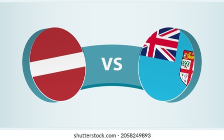 Latvia versus Fiji, team sports competition concept. Round flag of countries.