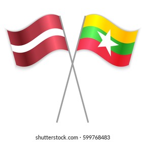 Latvian and Burmese crossed flags. Latvia combined with Myanmar isolated on white. Language learning, international business or travel concept.