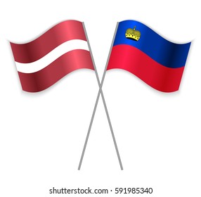 Latvian and Liechtenstein crossed flags. Latvia combined with Liechtenstein isolated on white. Language learning, international business or travel concept.