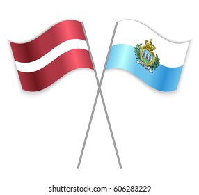 Latvian and Sammarinese crossed flags. Latvia combined with San Marino isolated on white. Language learning, international business or travel concept.